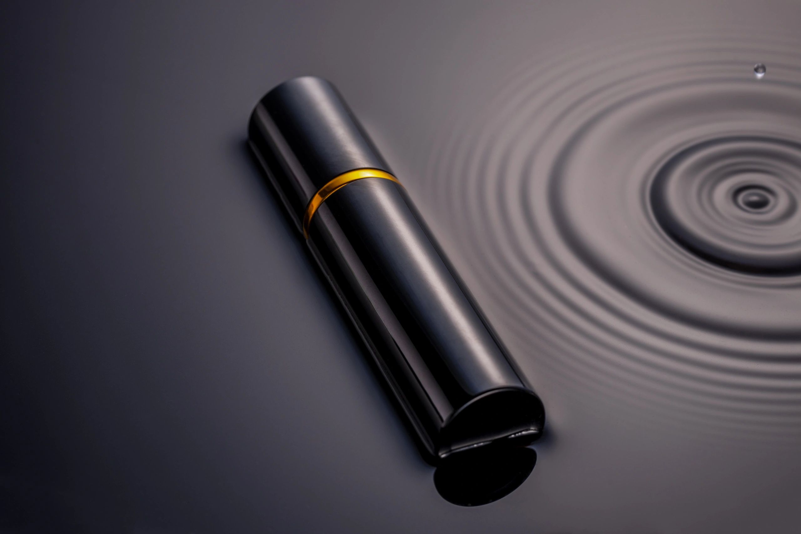 mysterious perfume bottle with gold accents